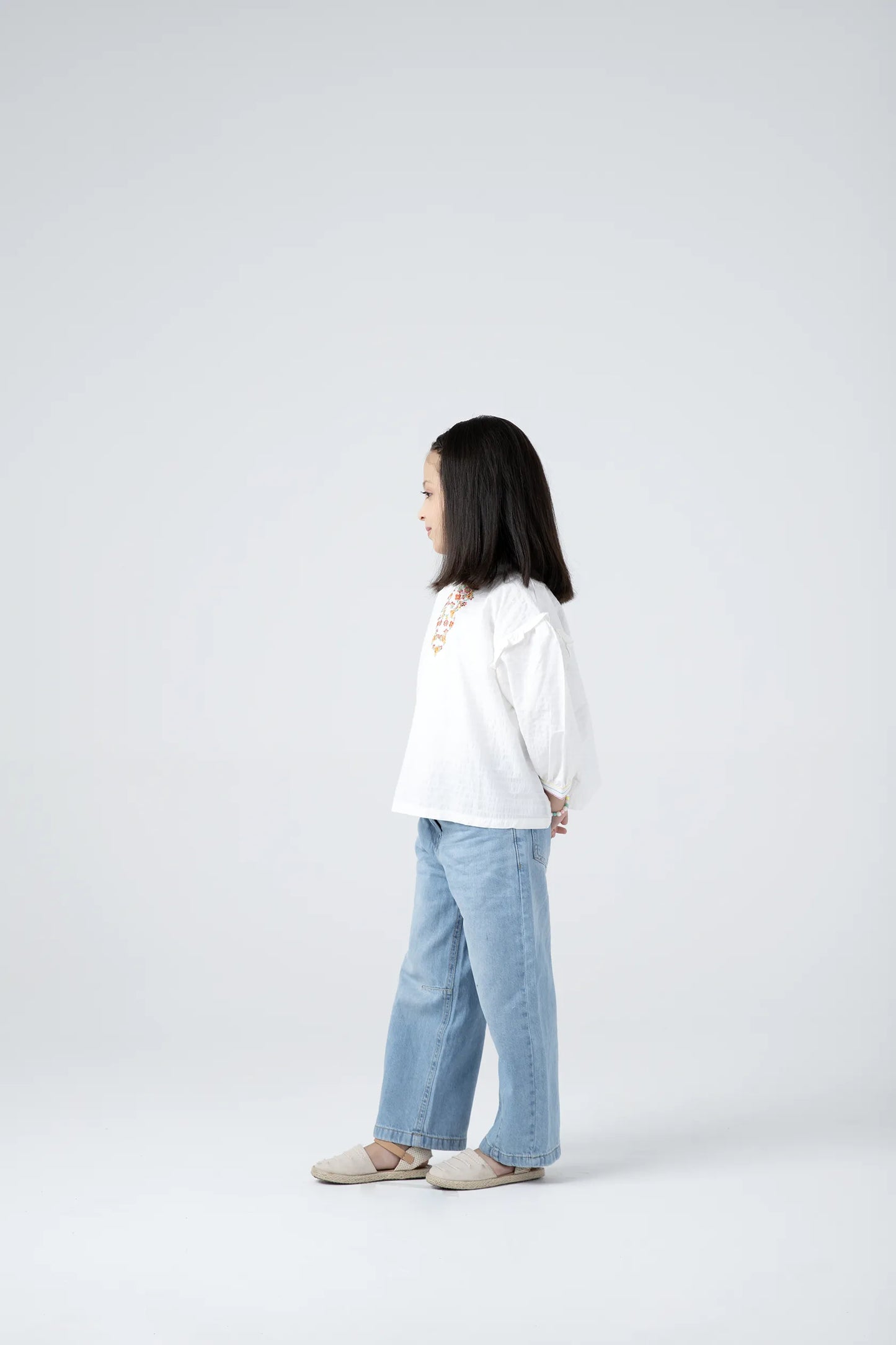 Thread Embroidered White Top